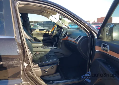 2012 Jeep Grand Cherokee Overland z USA, uszkodzony, nr VIN 1C4RJFCG1CC224624